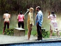 Bryce Dallas Howard and Paul Giamatti by the pool.